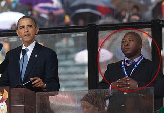 B Obama & interpreter B Obama & interpreter